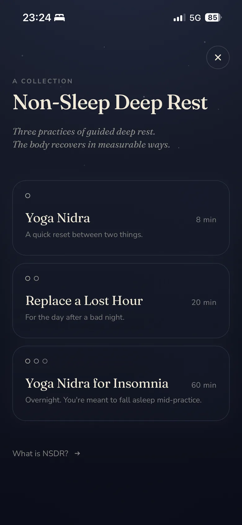 Stillee's Non-Sleep Deep Rest collection on iPhone, listing three practices: Yoga Nidra at eight minutes, Replace a Lost Hour at twenty minutes, and Yoga Nidra for Insomnia overnight, with a note that you're meant to fall asleep mid-practice.